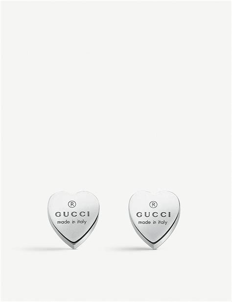 gucci silver earrings with heart motif